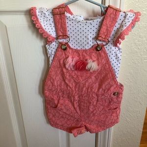 Beautiful baby jeweled overalls with matching top.